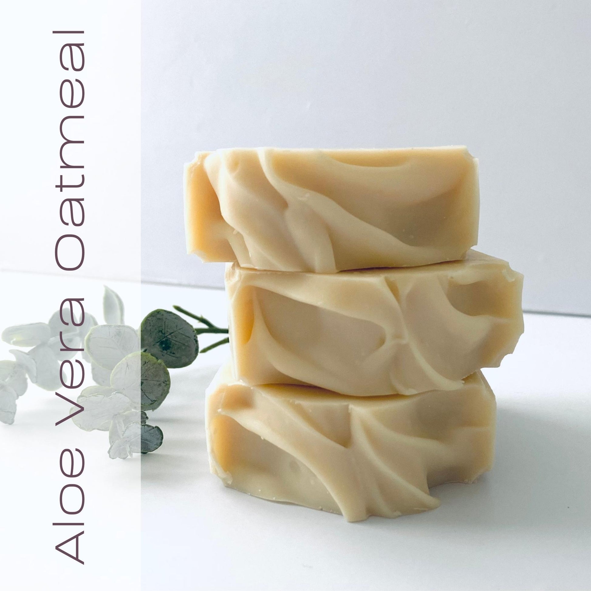 Handcrafted aloe vera oatmeal soap for moisturizing and soothing sensitive skin.